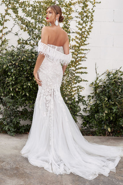Dazzling wedding dress featuring a mermaid silhouette and feather cape