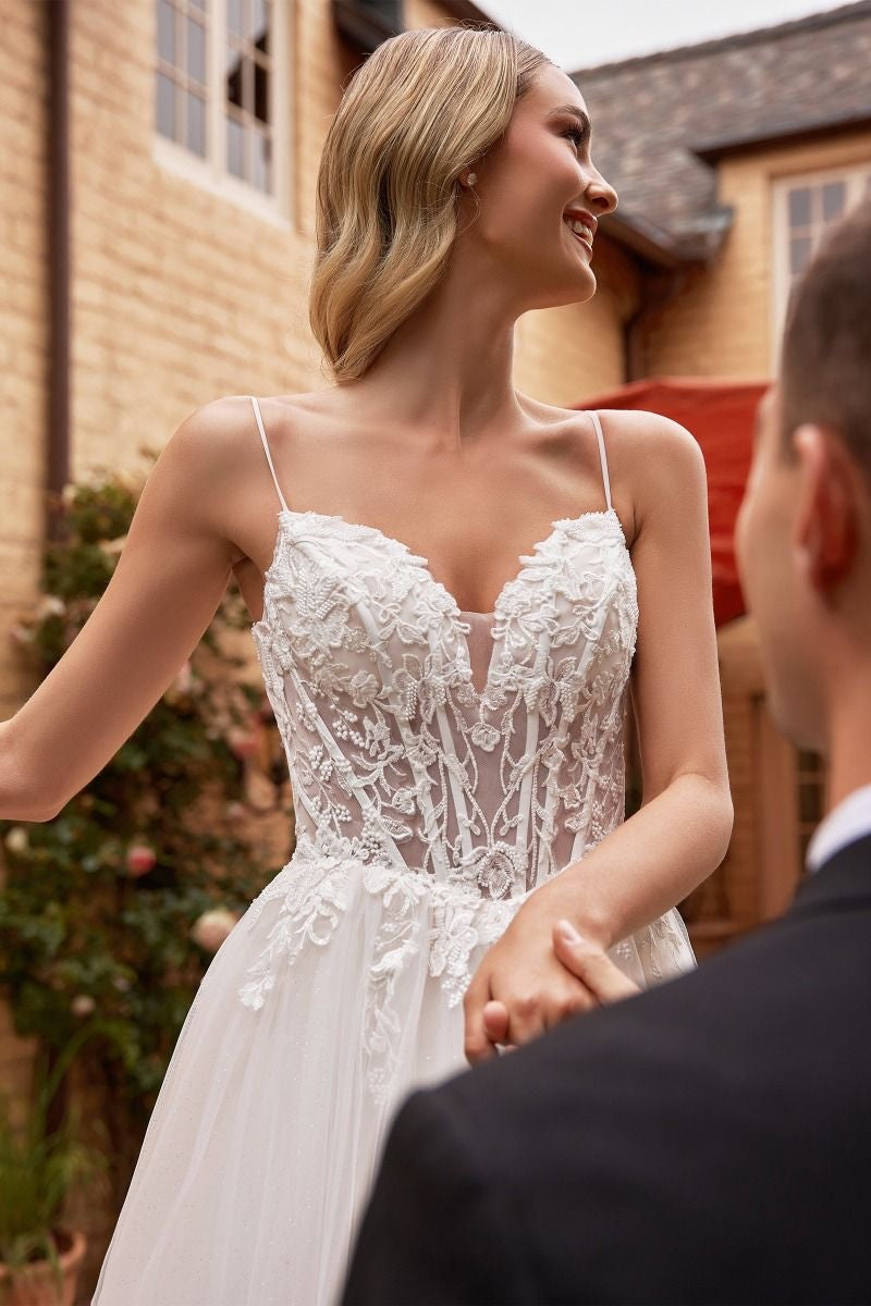 enchanting lace up corset back adds allure to your bridal look