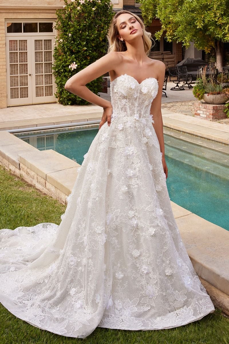 Feminine and elegant strapless wedding dress with dimensional floral applique