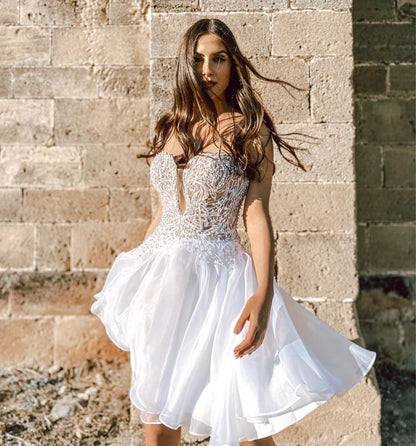 Feel like a bride-to-be in this versatile and glamorous corset mini dress