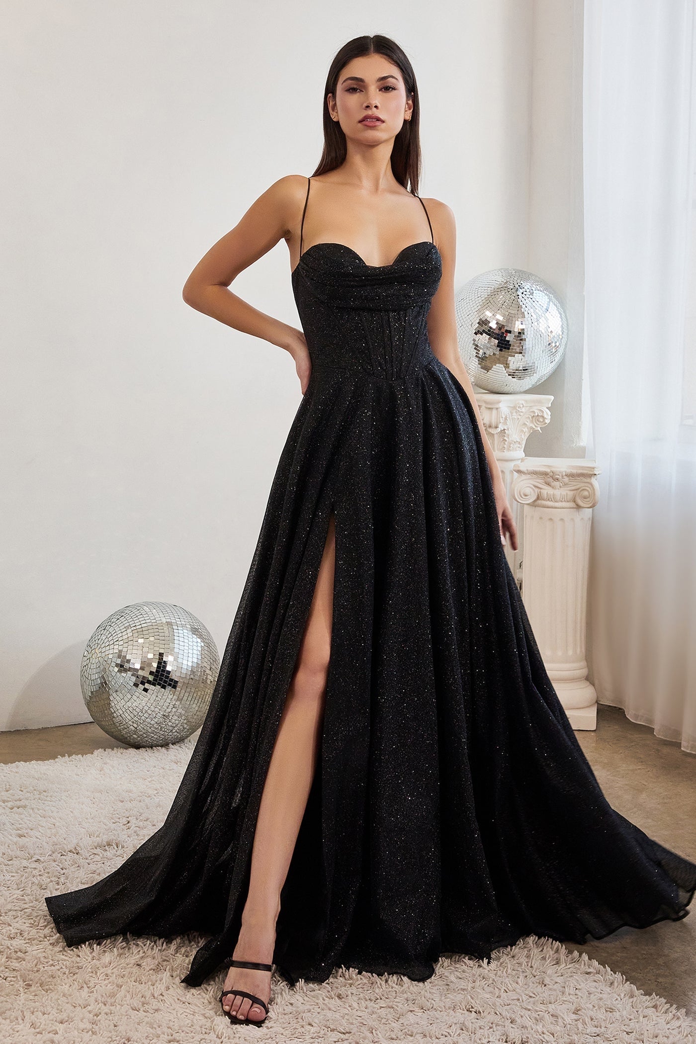 black dramatic ball gown with glitters and high cut