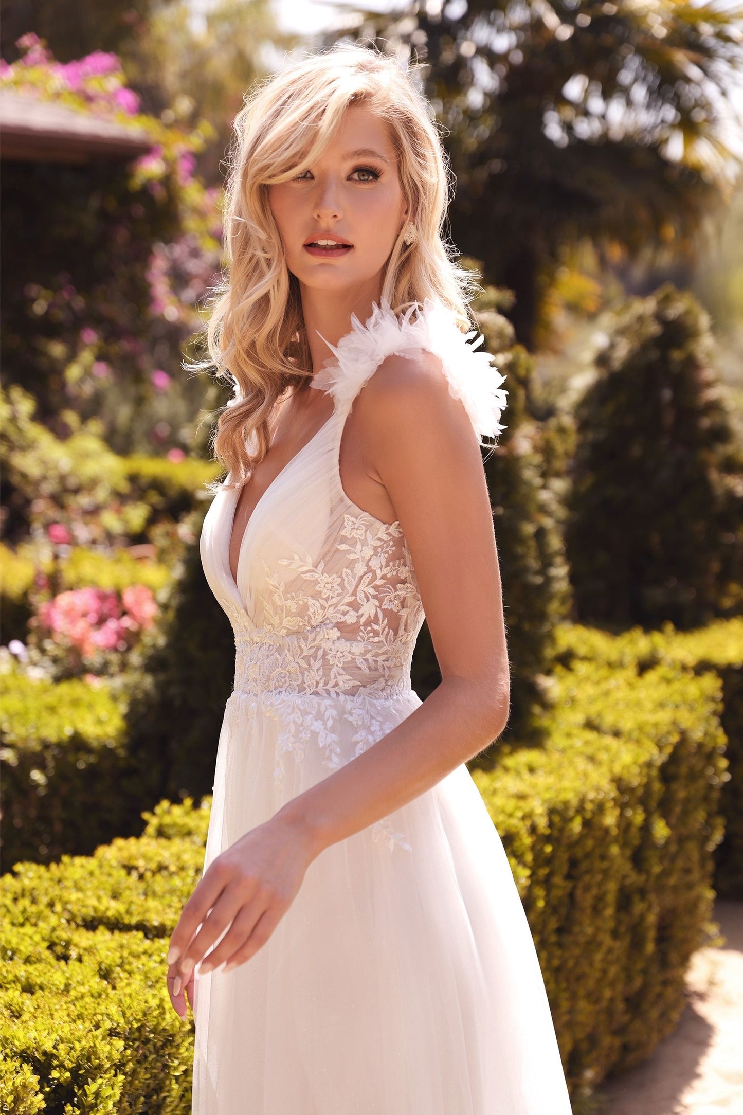 princess wedding gown with feathers