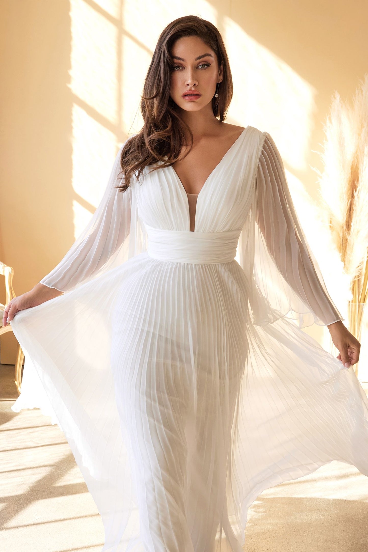 Versatile and boho-inspired chiffon gown, perfect for beach or rustic weddings vivienne westwood
