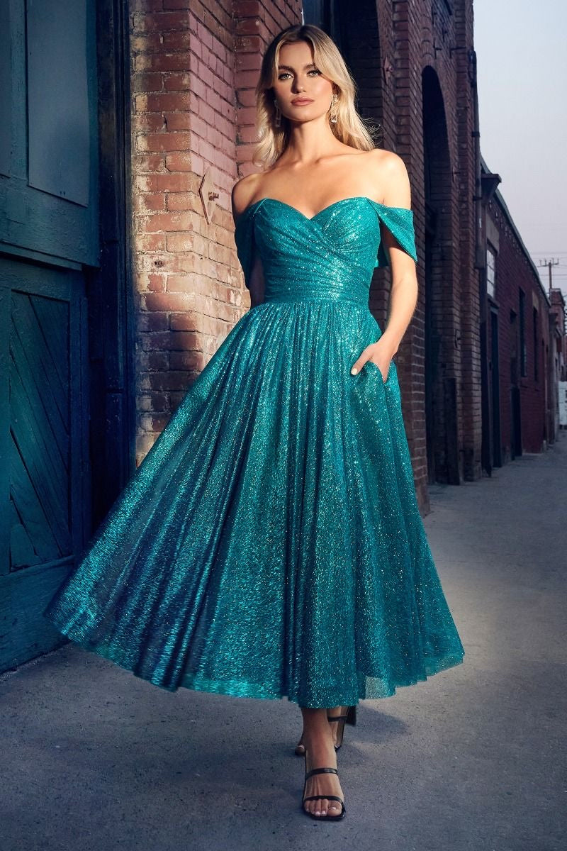 Sweetheart romantic fairy prom dress gown with glittered fabric with bodice corset with volume to the skirt.