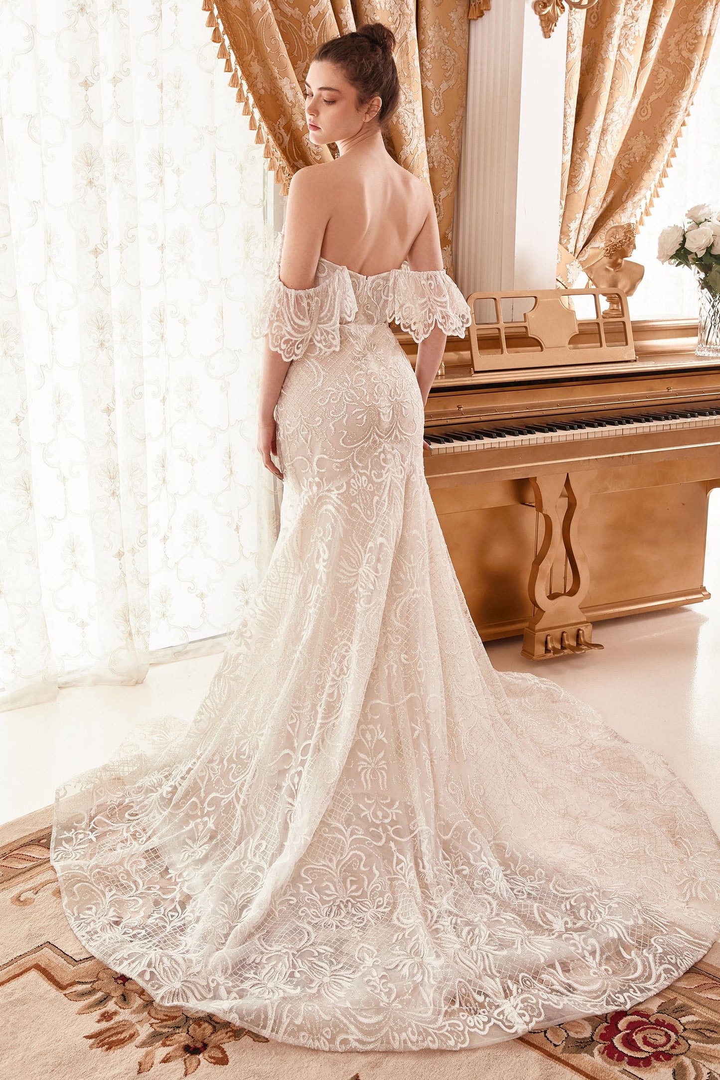 elegant and unique off the shoulder mermaid bridal gown featuring a mesmerizing baroque glitter pattern