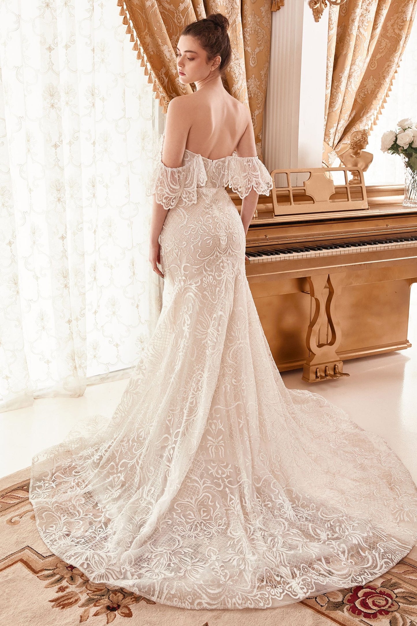 elegant and unique off the shoulder mermaid bridal gown featuring a mesmerizing baroque glitter pattern