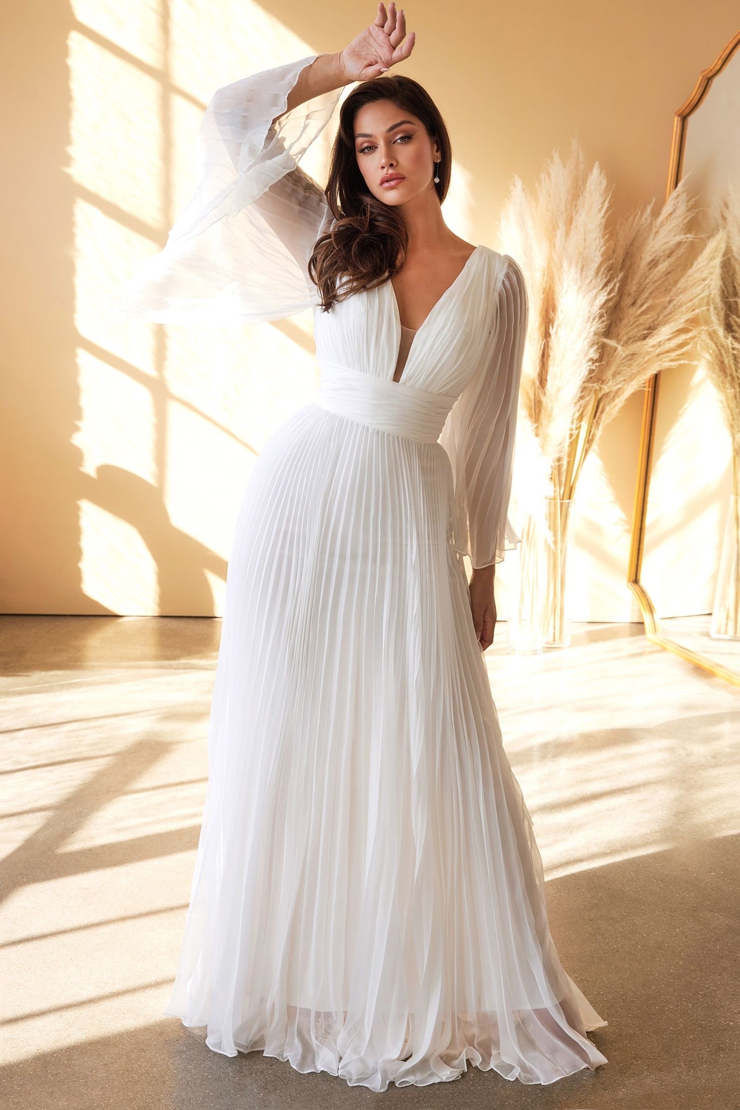 Alluring chiffon gown with an open mid back and center back zipper closure for a secure and comfortable fit wedding dresses with sleeves