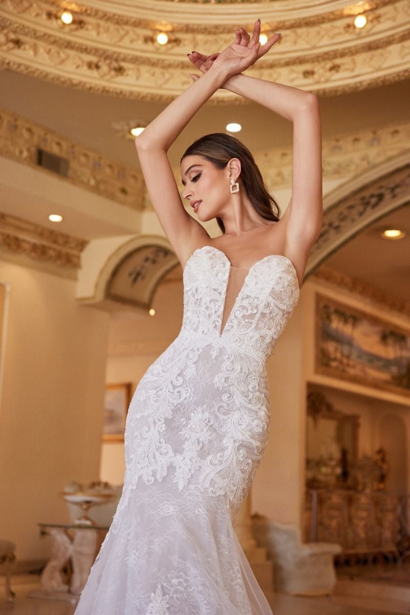 The intricate lacework and stunning hourglass silhouette of this gown will make you feel truly magical