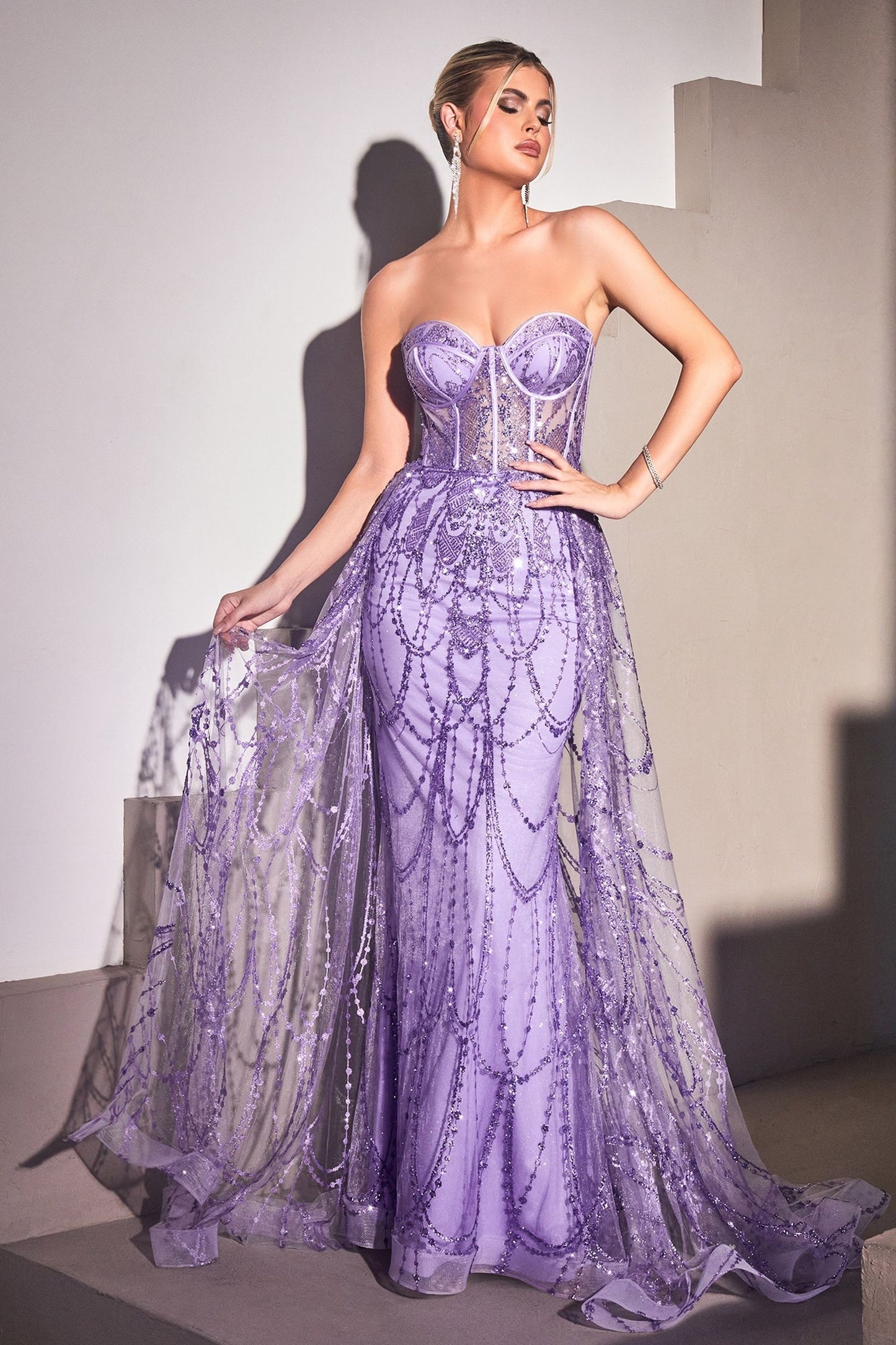 Mesmerizing sheer overskirt strapless mermaid gown