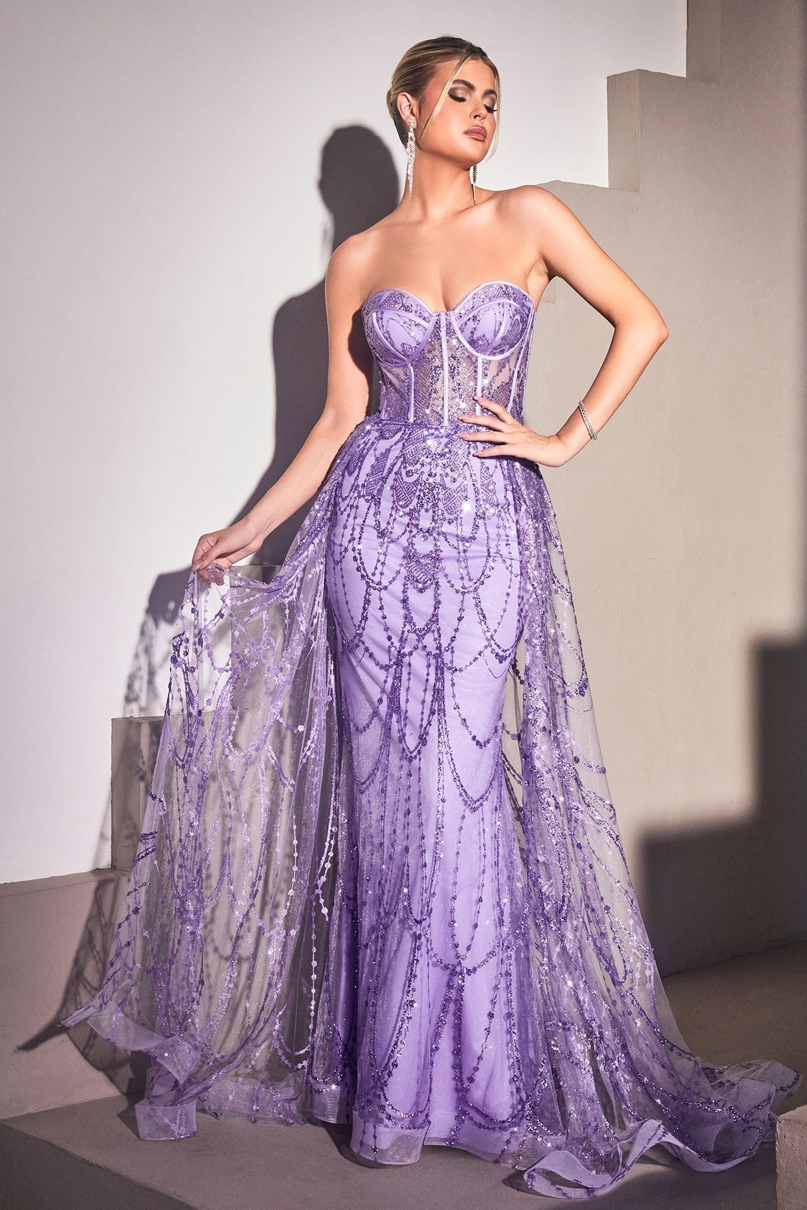 Mesmerizing sheer overskirt strapless mermaid gown