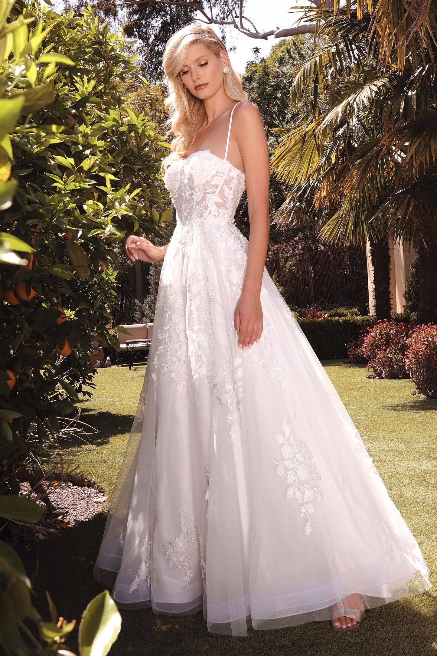 Alluring open-backed lace design with criss-cross spaghetti straps on the A-line dress, adding sophistication and allure