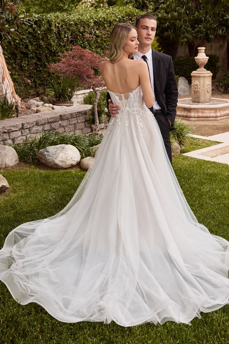 Strapless tulle wedding dress with a sweetheart neckline bodice, highlighting natural beauty and offering a flattering hourglass figure