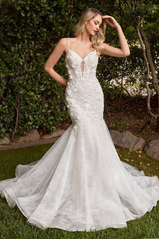 Unique lace mermaid wedding dress with dimensional floral applique and a flattering silhouette
