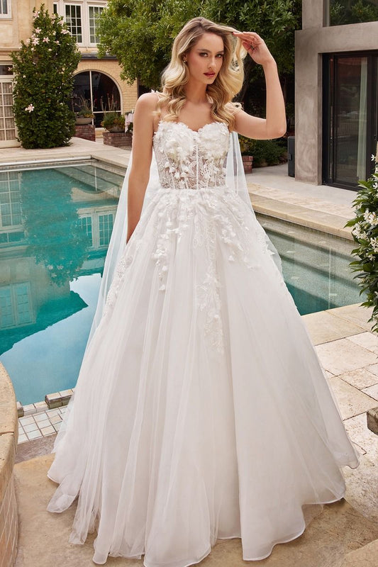Elegant floral wedding ball gown with a long tulle overlay and intricate floral appliques