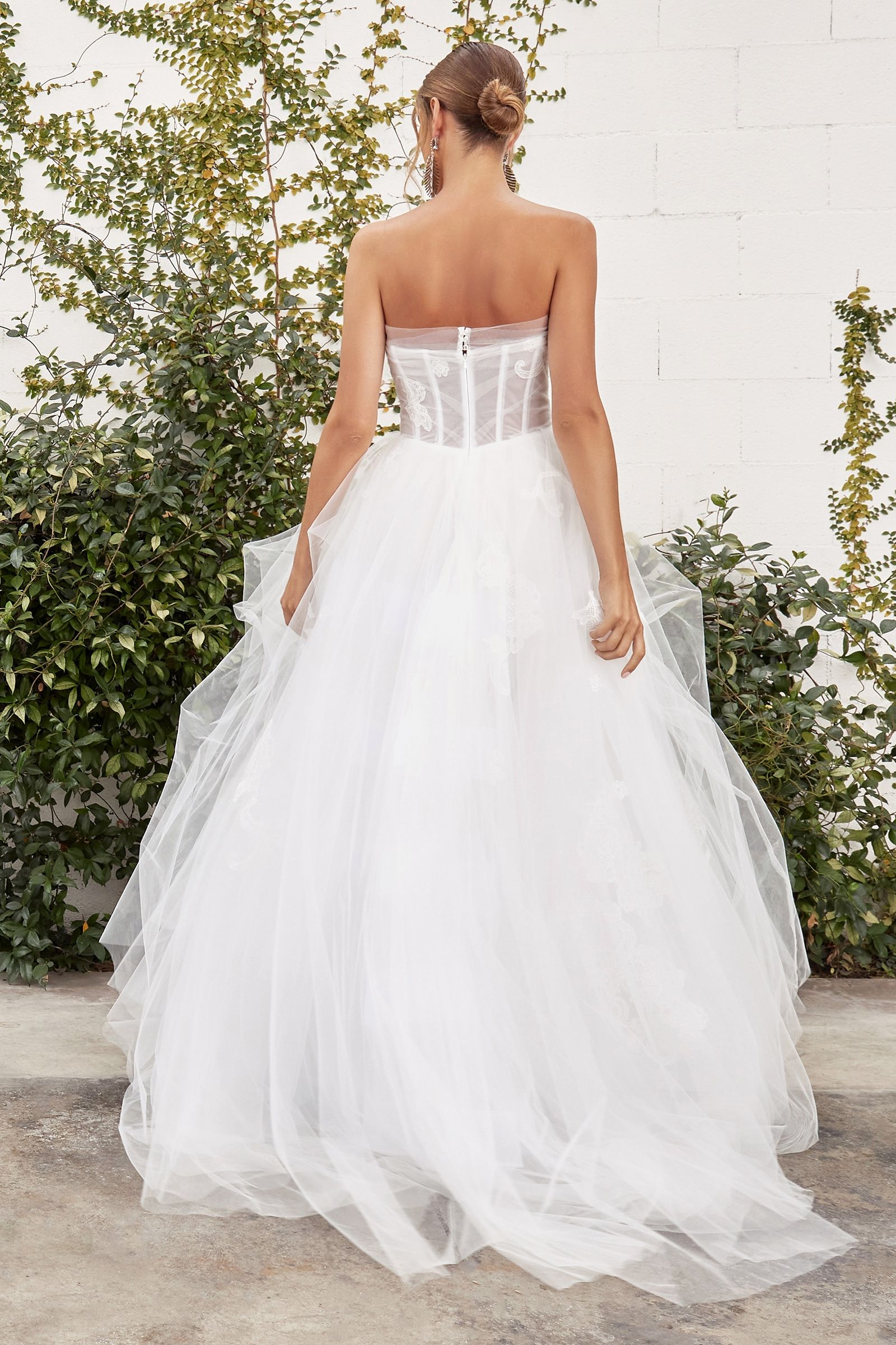 Dramatic tulle skirt cascading in layers for a grand and ethereal look