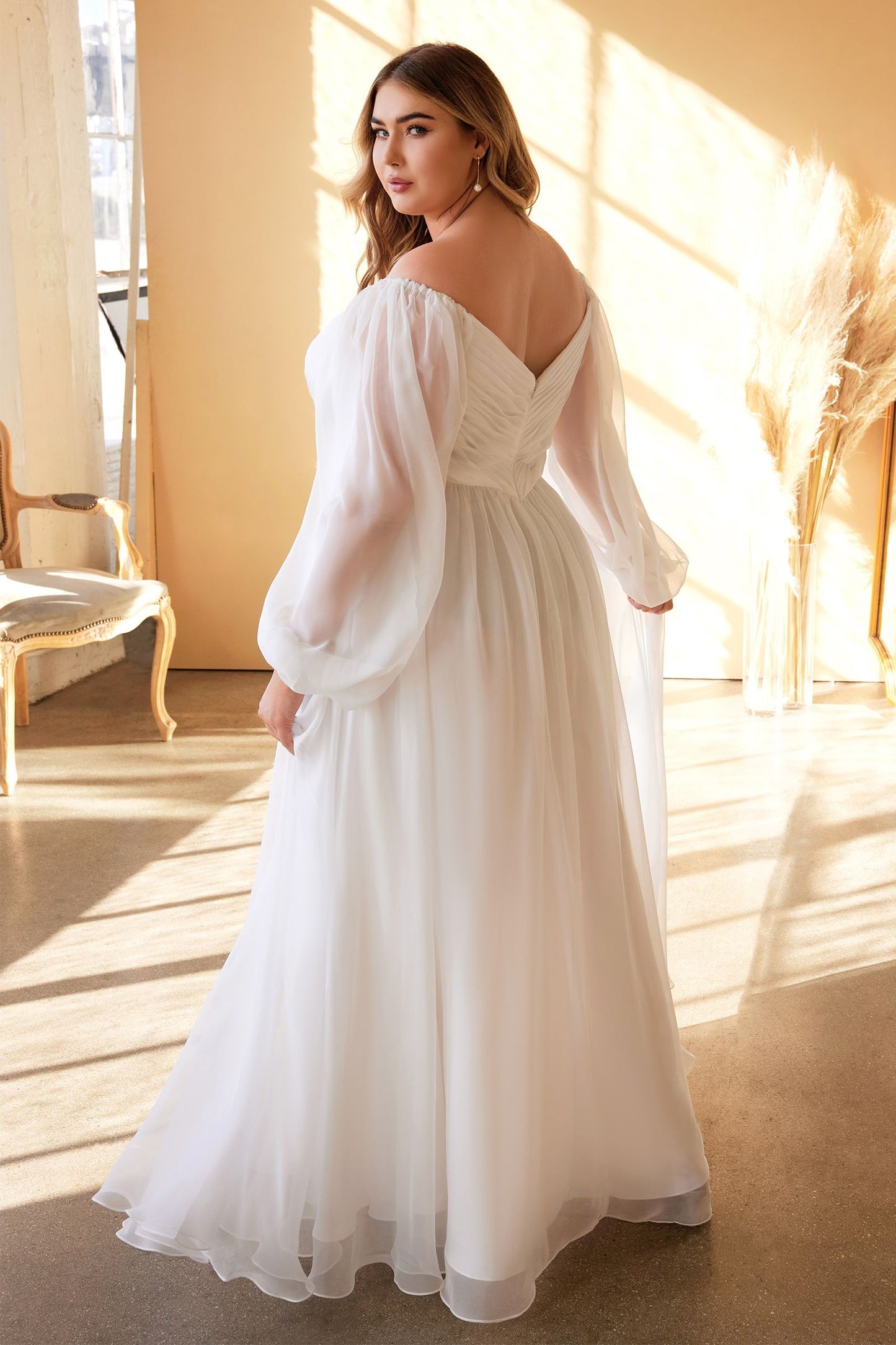 Enchanting diaphanous gown with sweetheart neckline and frothy A-line skirt