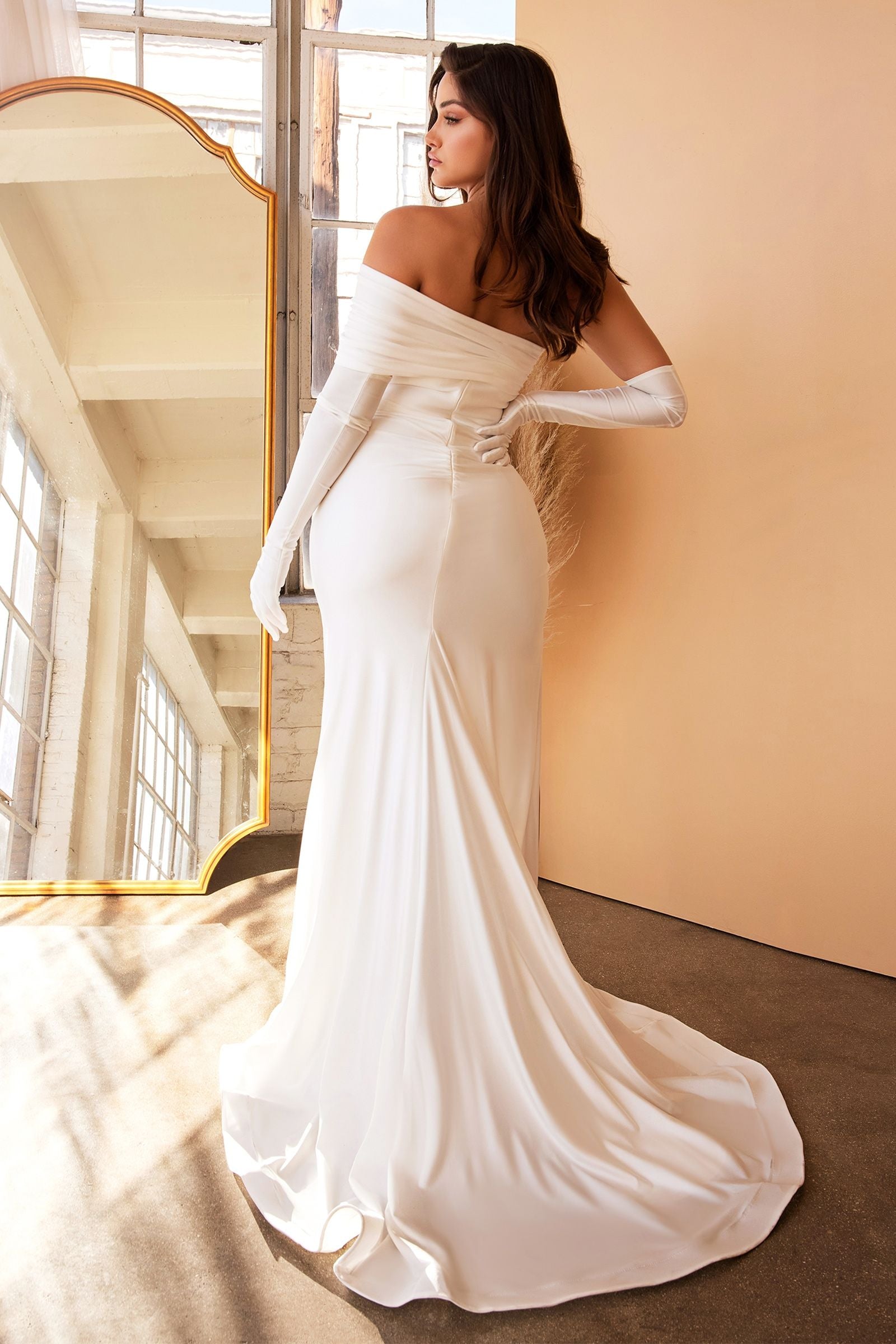 Stunning white jersey gown with a leg slit, embodying the luxurious Glamour Glove Luxe aesthetic