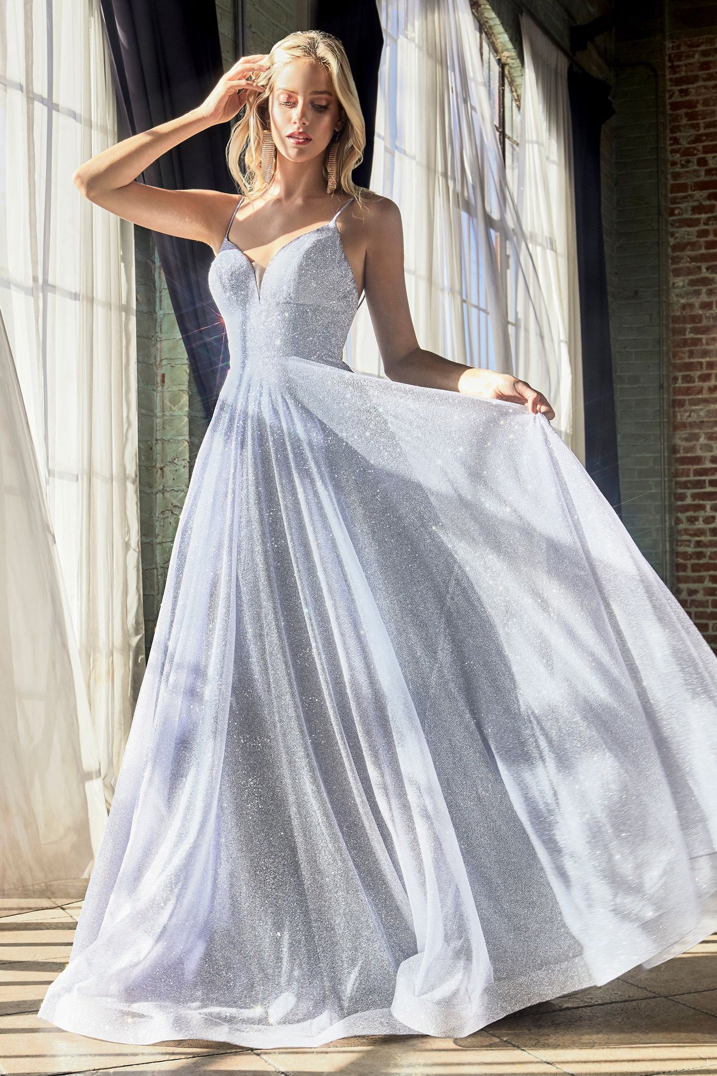 Sparkling glitter light blue dress with a deep sweetheart neckline and thin straps.