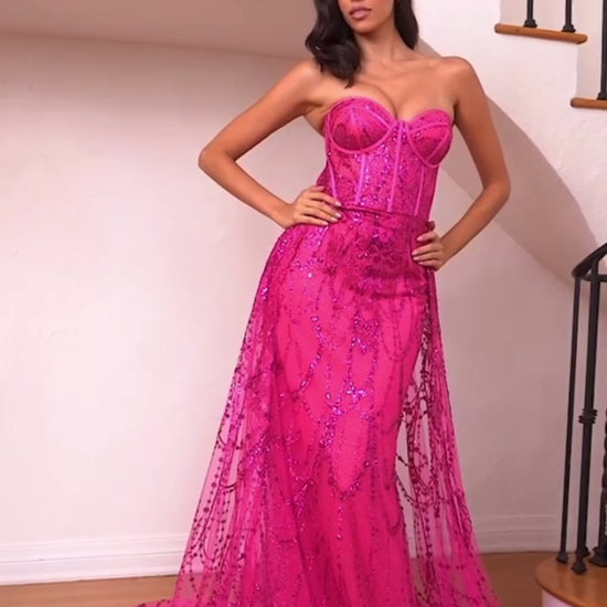 fuchsia color prom dress with glitters and overskirt