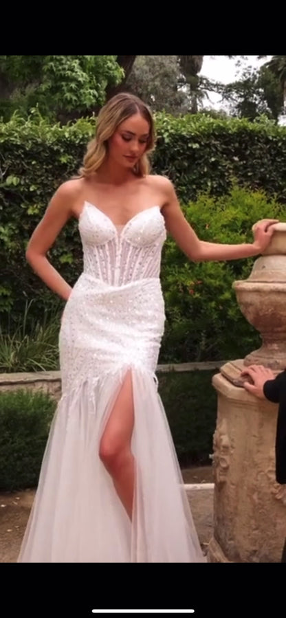 eye catching mermaid wedding dress with a touch of glamour
