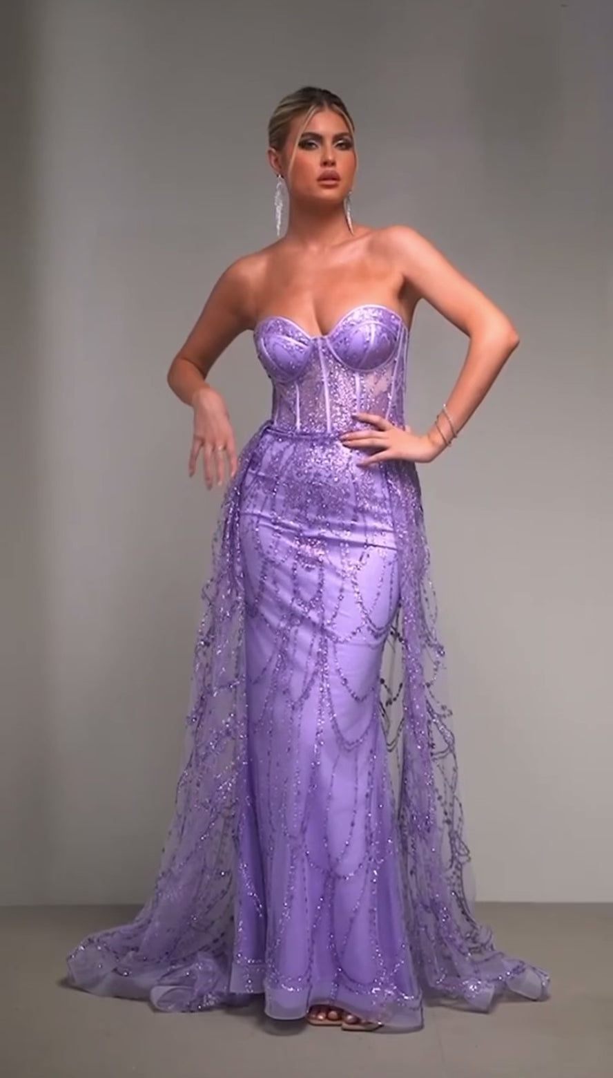 Classy and alluring strapless mermaid gown for any occasion with glitters in lavender color