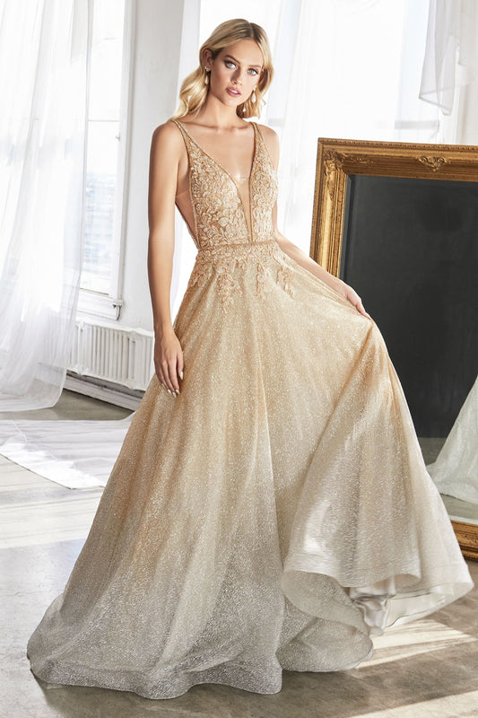 A long ball gown with an ombre glitter finish and a lace beaded bodice.