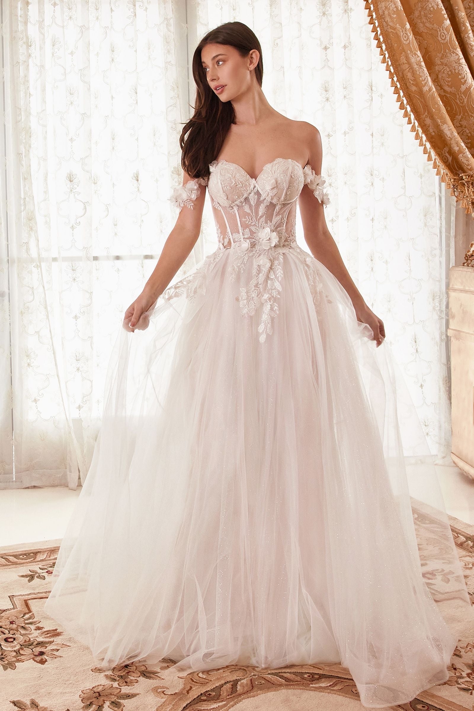 Graceful and feminine gown with off-white floral applique, sheer boned corset bodice, and sweetheart neckline