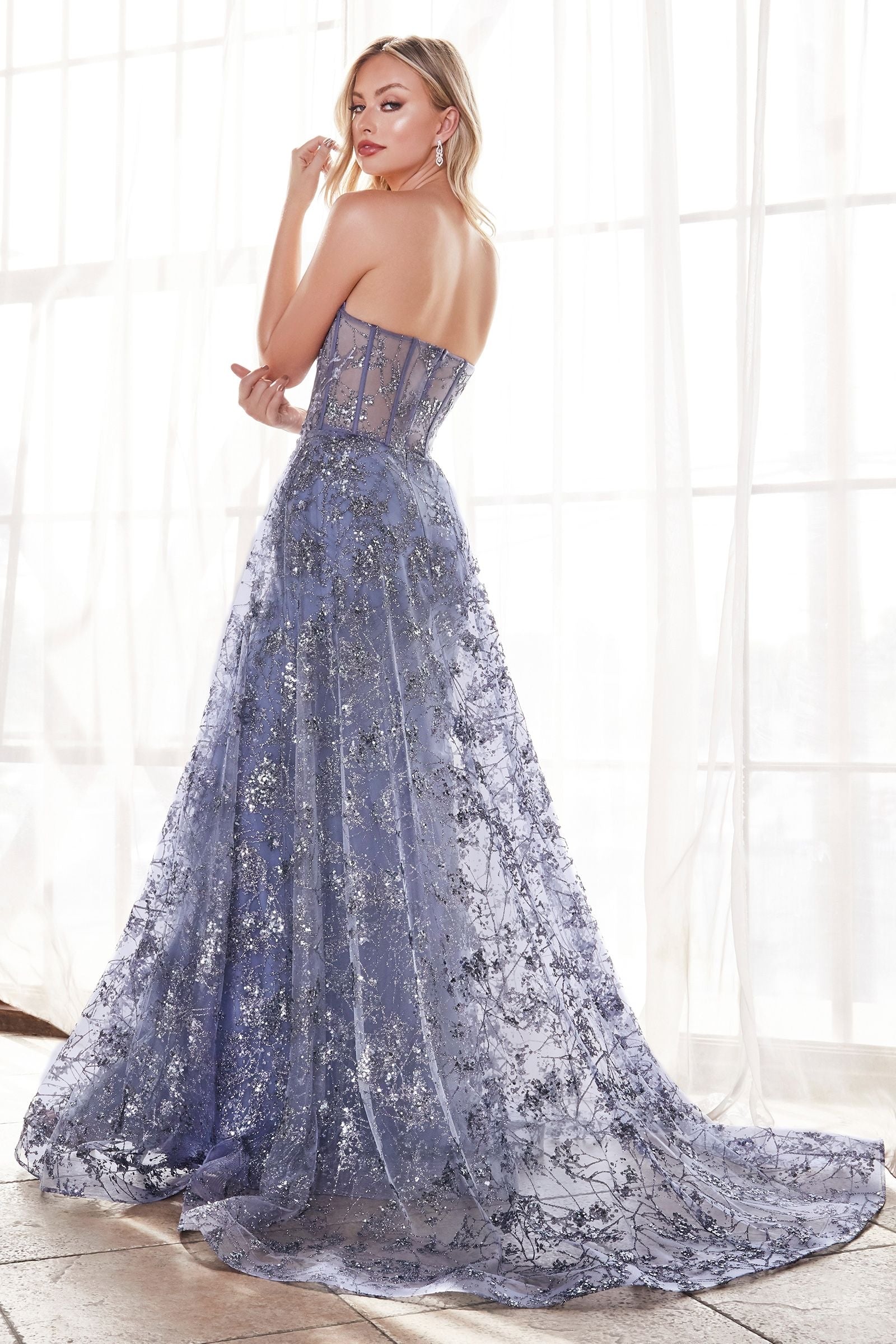 Alluring strapless mermaid gown with a boned bodice corset for a perfect fit.