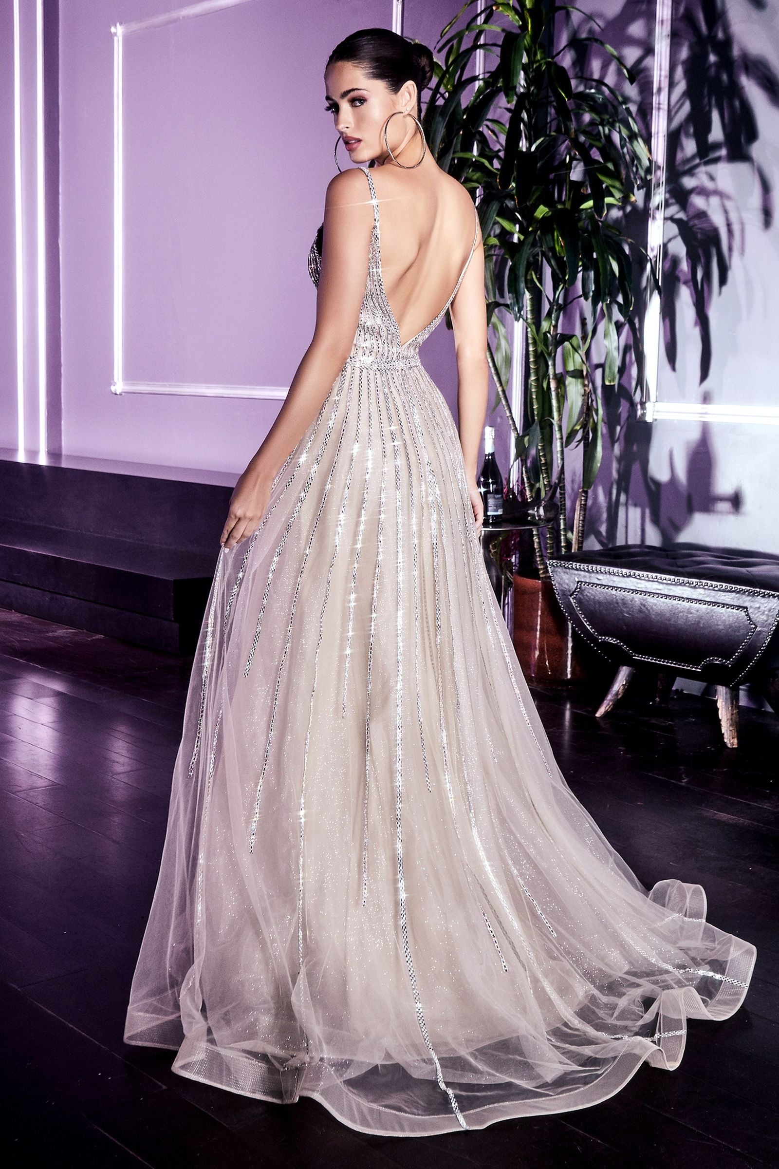 A back view of the Dazzling A-Line Tulle Gown, revealing its plunging back design for an alluring look.
