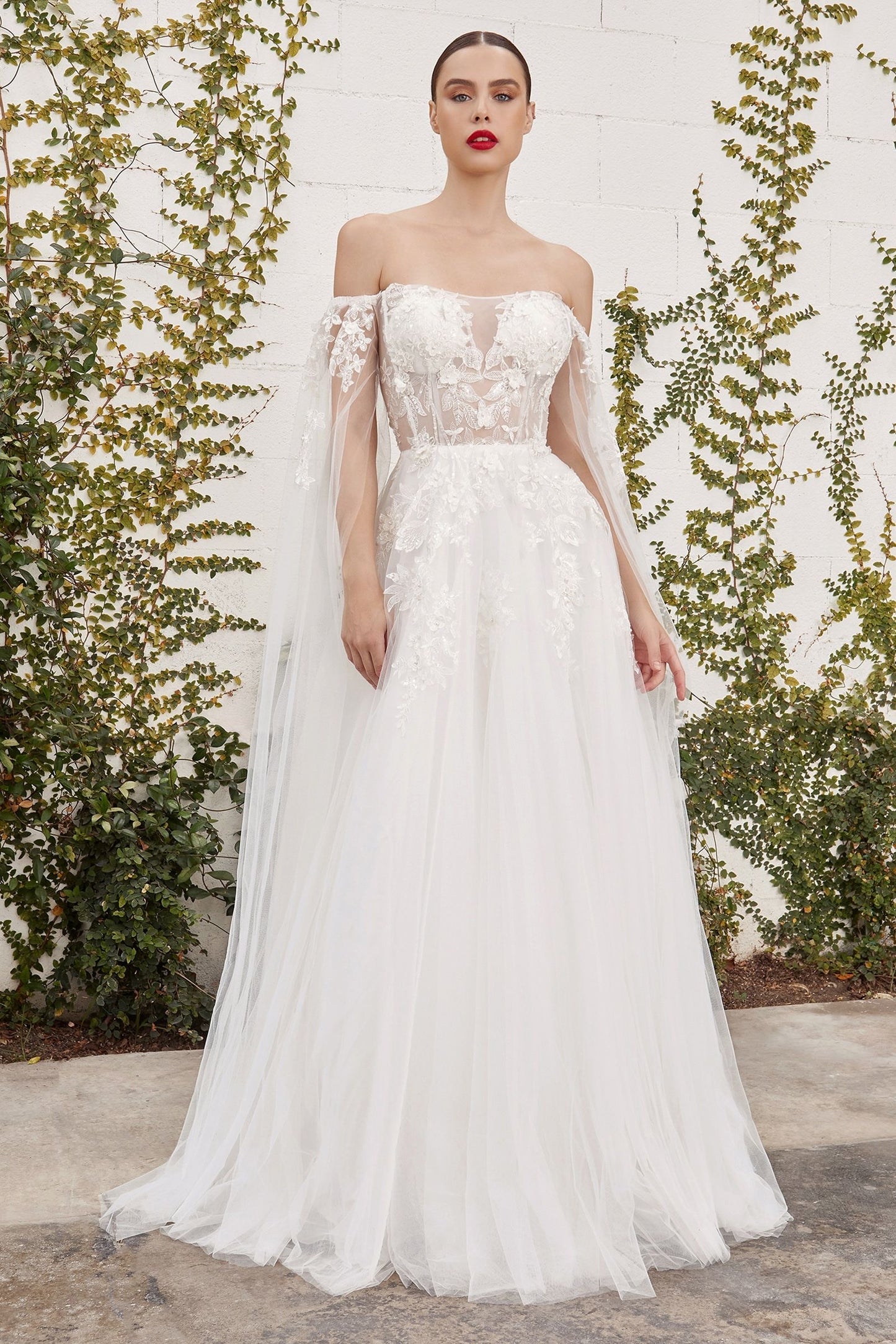 ball gown wedding dress with extra tulle on shoulders