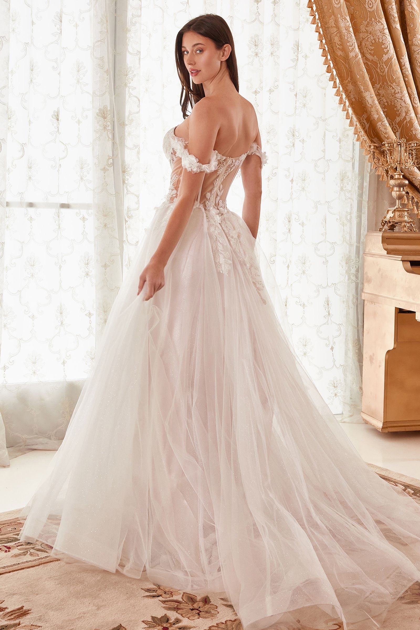 Unforgettable and romantic ethereal gown with off-white floral applique and layered ball gown design