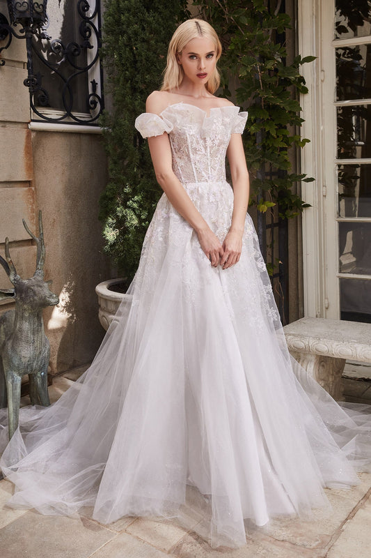 breathtaking blossom wedding gown adorned with flowers and a flowing tulle skirt