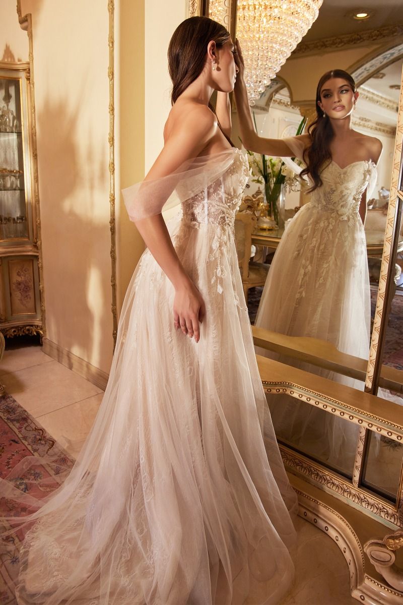Ethereal wedding gown with chantilly lace underlay and intricate beadwork for a beautiful interplay of textures