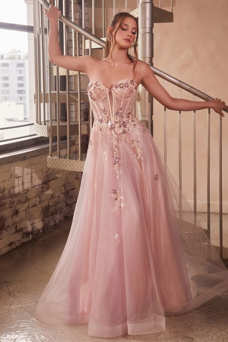 A whimsical strapless tulle ball gown, capturing the essence of romance. prom dresses london