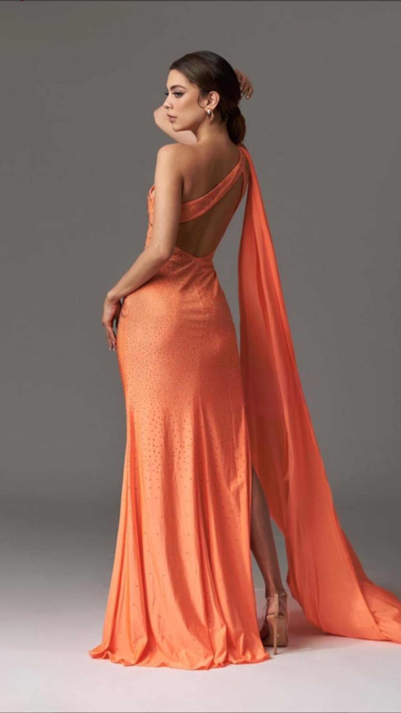 backless formal evening dress in neon orange color