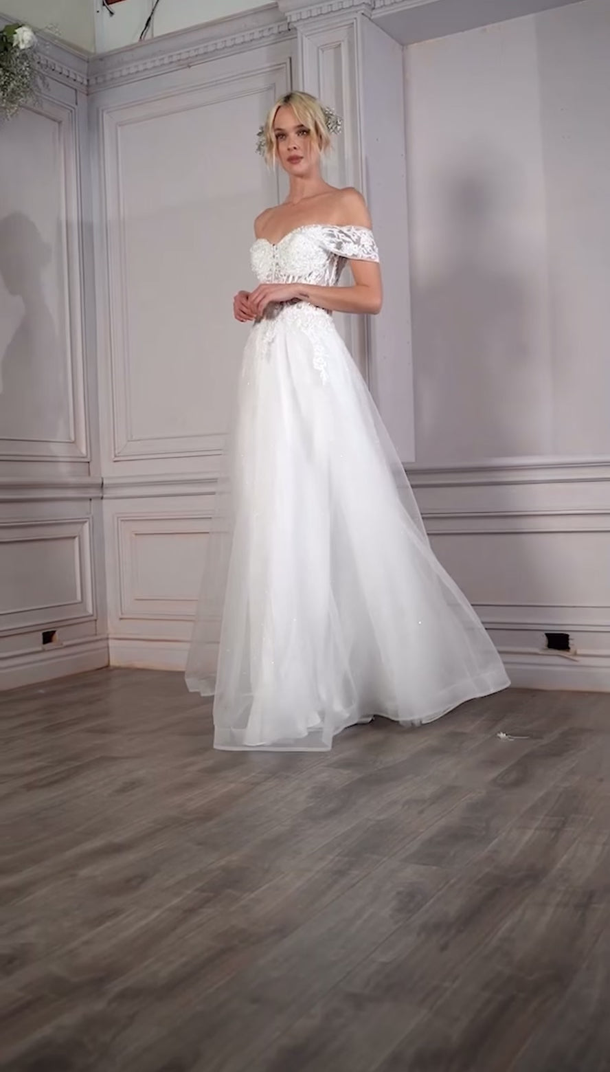 feel like a princess in this beautiful gown with layers of tulle and floral lace applique